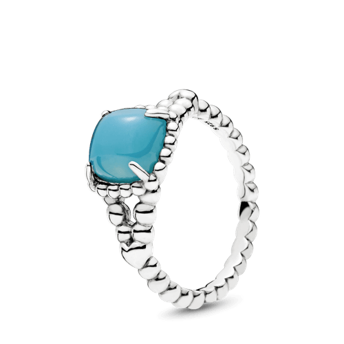 Anillo de plata espíritu vibrante con cristal turquesa